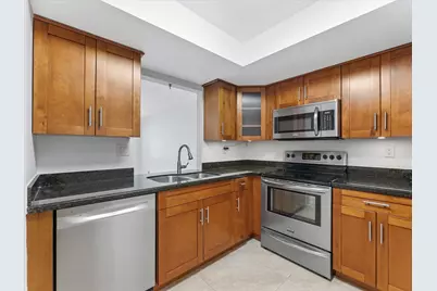 1821 NE 40th Court #305, Pompano Beach, FL 33064 - Photo 9