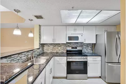 5011 Wiles Road #Unit 303, Coconut Creek, FL 33073 - Photo 3