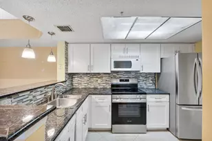 5011 Wiles Rd, Coconut Creek, FL 33073 - Photo 1