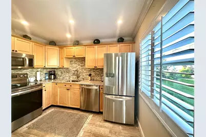 18 Colonial Club Drive #104, Boynton Beach, FL 33435 - Photo 3
