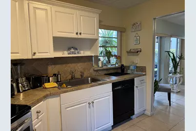 7 N Greenway Vlg Village N #107, Royal Palm Beach, FL 33411 - Photo 3