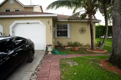 201 Maplewood Drive #201, Greenacres, FL 33415 - Photo 1