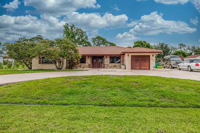 2165 SE Flanders Road, Port Saint Lucie, FL 34952 - Photo 1