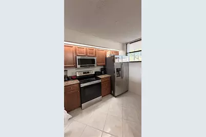 110 Lake Emerald Drive #107, Oakland Park, FL 33309 - Photo 5