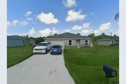 1085 SW Firestone Avenue, Port Saint Lucie, FL 34953 - Photo 1