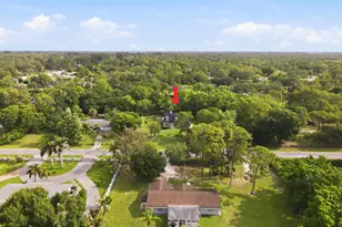 16317 Glasgow Dr E, The Acreage, FL 33470 - Photo 49