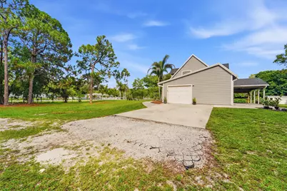 16317 Glasgow Drive E, The Acreage, FL 33470 - Photo 39