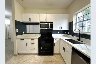 641 Cypress Lake Boulevard #K18, Pompano Beach, FL 33064 - Photo 13