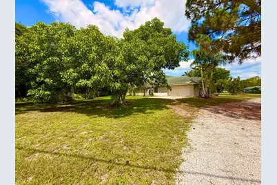 12037 Temple Boulevard, The Acreage, FL 33412 - Photo 87