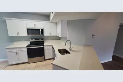 9033 Wiles Road #308, Coral Springs, FL 33067 - Photo 7