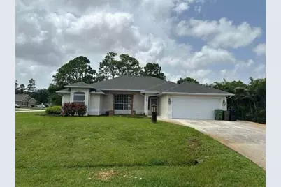 102 NW Peach Street, Port Saint Lucie, FL 34983 - Photo 1