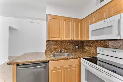 212 Lake Pointe Drive #302, Oakland Park, FL 33309 - Photo 11