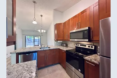 3054 S Oakland Forest Drive #2206, Oakland Park, FL 33309 - Photo 1