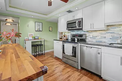 3930 Oaks Clubhouse Drive #304, Pompano Beach, FL 33069 - Photo 13