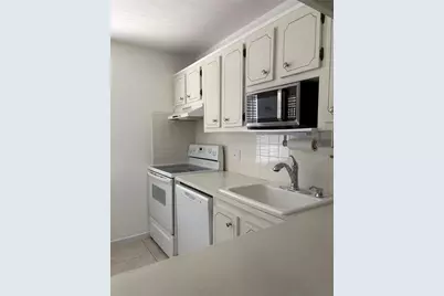 1055 Country Club Drive #404, Margate, FL 33063 - Photo 5
