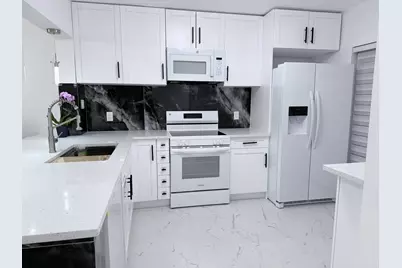 300 E Club Circle #107, Boca Raton, FL 33431 - Photo 1