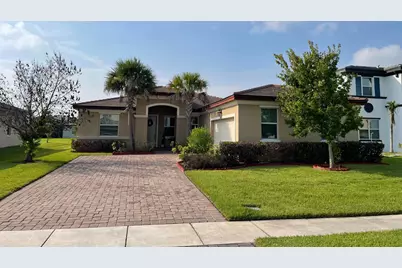 7413 NW Greenspring Street, Port Saint Lucie, FL 34987 - Photo 1