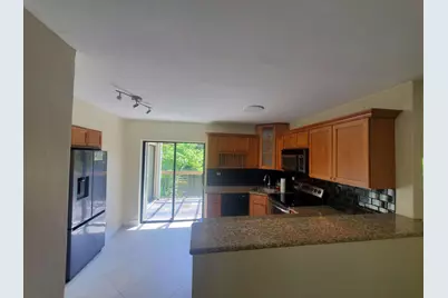 12 Wimbledon Lakes Drive #250, Plantation, FL 33324 - Photo 3