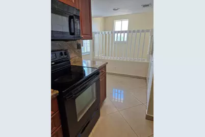 2823 N Course Drive #205, Pompano Beach, FL 33069 - Photo 5