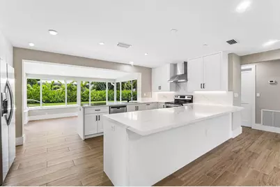 945 Westwind Drive, North Palm Beach, FL 33408 - Photo 1