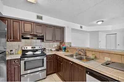 1733 Village Boulevard #105, West Palm Beach, FL 33409 - Photo 3