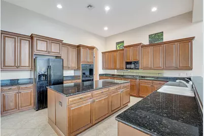10513 Versailles Boulevard, Wellington, FL 33449 - Photo 15