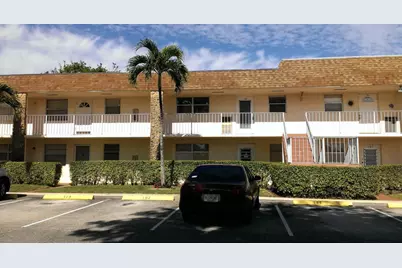 9911 Sandalfoot Boulevard #112, Boca Raton, FL 33428 - Photo 1