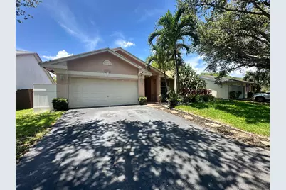 9825 NW 54th Place, Coral Springs, FL 33076 - Photo 1