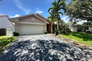 9825 NW 54th Pl, Coral Springs, FL 33076 - Photo 1
