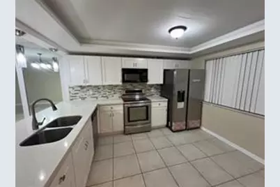 8040 Hampton Boulevard #104, North Lauderdale, FL 33068 - Photo 5