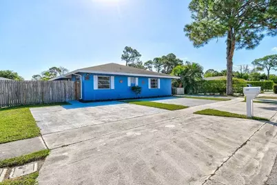 9046 E Highland Pines Boulevard E, Palm Beach Gardens, FL 33418 - Photo 1