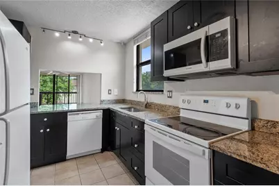 8429 Forest Hills Drive #304, Coral Springs, FL 33065 - Photo 3
