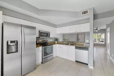 9905 NW 57th Manor, Coral Springs, FL 33076 - Photo 23