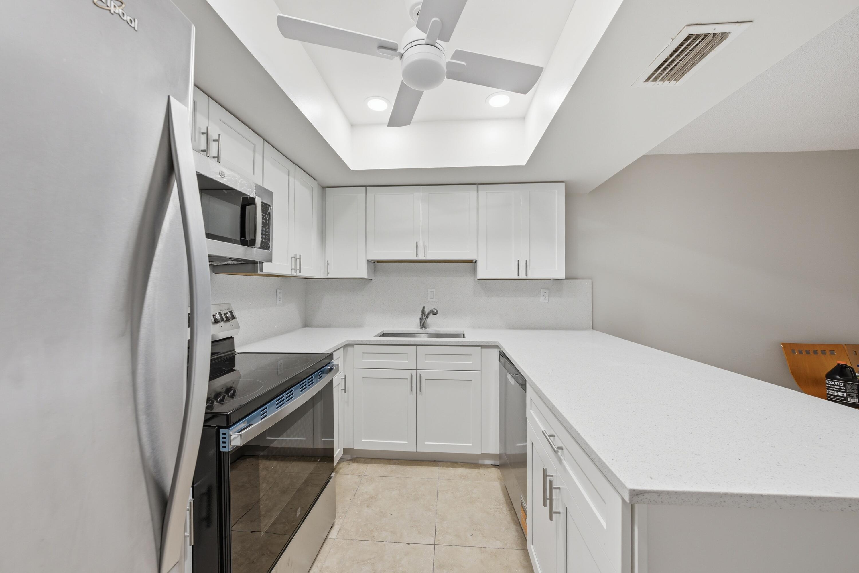 52 Canterbury Ln - 52 Canterbury Ln, Tamarac, FL 33319 Luxury Property | Jose Angel Pina