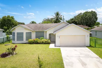 1058 SW Locke Avenue, Port Saint Lucie, FL 34953 - Photo 1