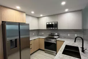 427 Golden Isles Dr, Hallandale Beach, FL 33009 - Photo 1