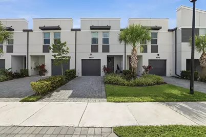 5650 Enclave Drive, Mangonia Park, FL 33407 - Photo 1