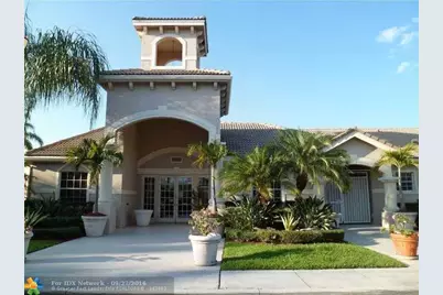 5035 Wiles Road #104, Coconut Creek, FL 33073 - Photo 1