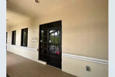 7451 Wiles Road #202, Coral Springs, FL 33067 - Photo 1