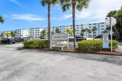 108 Paradise Harbour Boulevard #107, North Palm Beach, FL 33408 - Photo 1