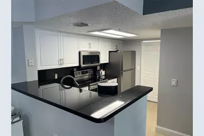 5051 Wiles Road #207, Coconut Creek, FL 33073 - Photo 5