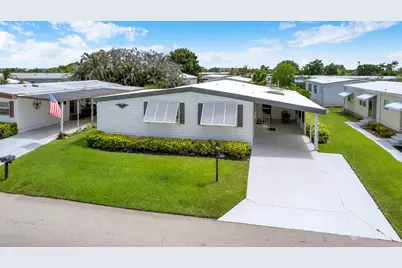 140 NE Pinelake Village Boulevard, Jensen Beach, FL 34957 - Photo 1