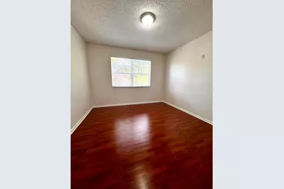 5840 W Sample Road #303, Coral Springs, FL 33067 - Photo 13