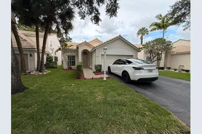 7657 Sanctuary Drive, Coral Springs, FL 33065 - Photo 1