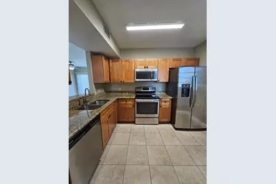 1049 Golden Lakes Boulevard #115, West Palm Beach, FL 33411 - Photo 3
