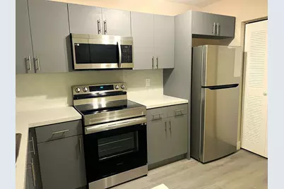 11241 W Atlantic Boulevard #204, Coral Springs, FL 33071 - Photo 1