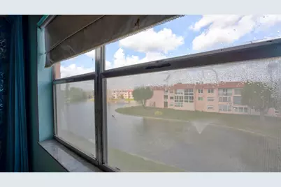 9400 Sunrise Lakes Boulevard #303, Sunrise, FL 33322 - Photo 11