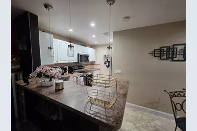10046 Winding Lake Road #202, Sunrise, FL 33351 - Photo 7