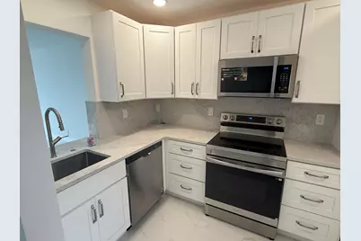 460 Paradise Isle Boulevard #101, Hallandale Beach, FL 33009 - Photo 9