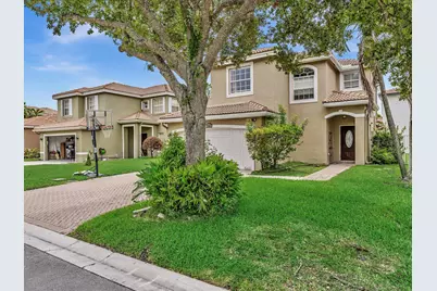 7145 Crescent Creek Place, Coconut Creek, FL 33073 - Photo 1